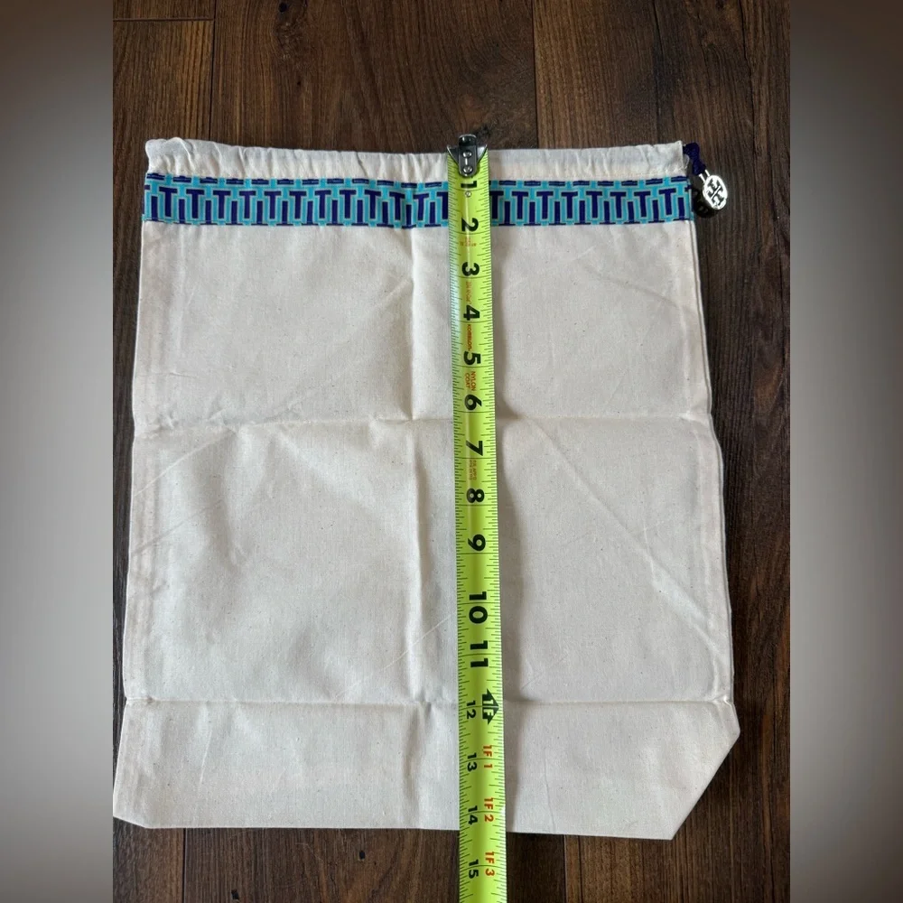 Tory Burch Cream Canvas Dust Bag with Blue Trim and Gold Charm